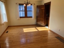 Entry / dining area with great natural lighting and refinished maple floors - 509 E Vernon Ave