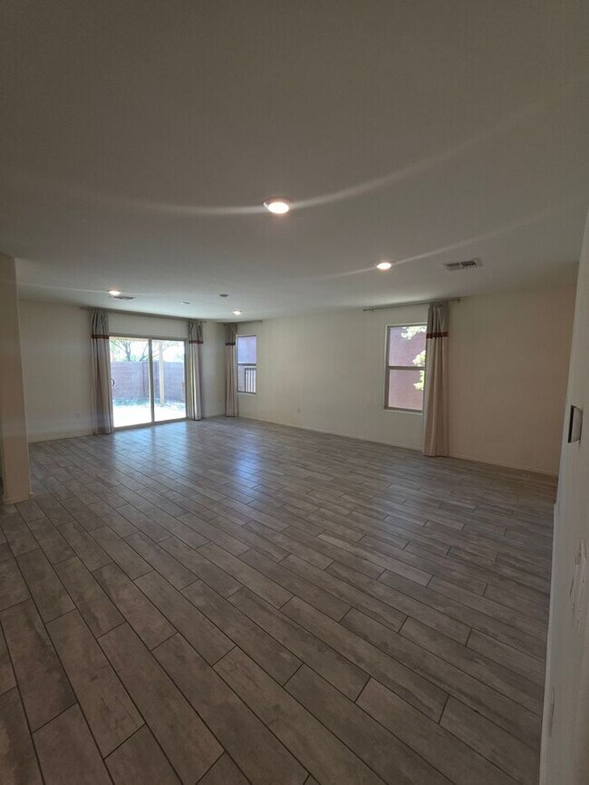 Building Photo - COMING SOON! New 3BR 2 BA Home w/ 2-Car Garage • Stainless Kitchen • Timer-Irrigated Yard in East...