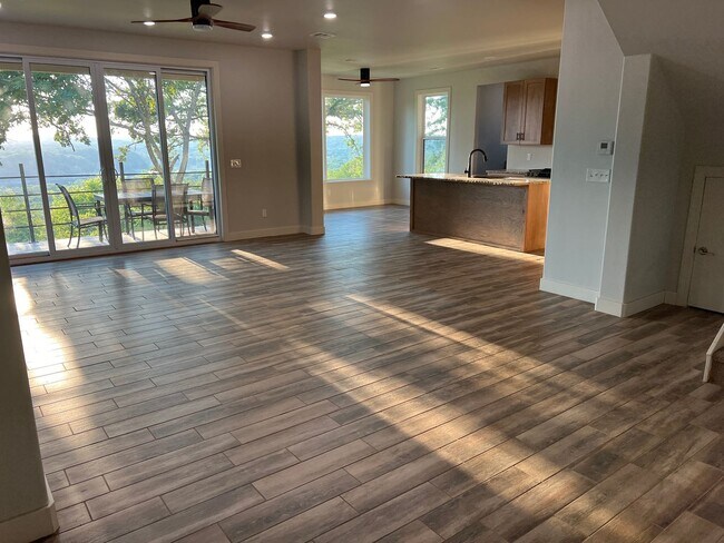 Building Photo - Stunning Lake living home with a lake view...