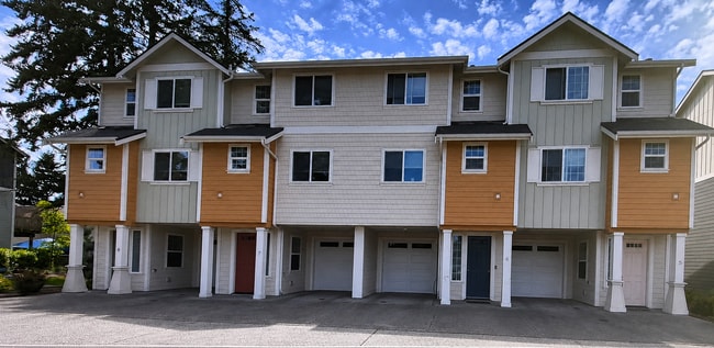 Building Photo - Check out our Spacious Condominiums on this sunny day!!