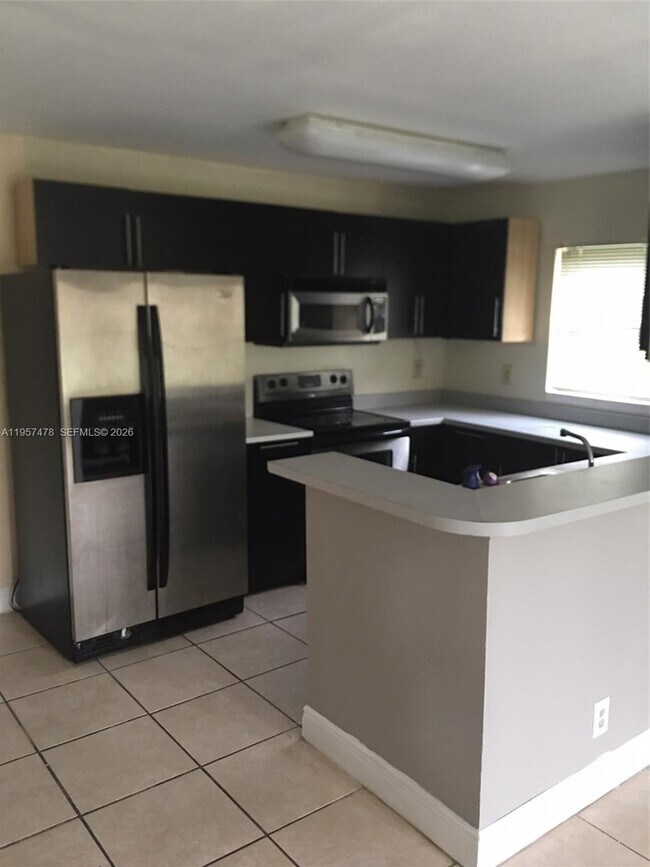 Building Photo - 4090 NW 88th Ave