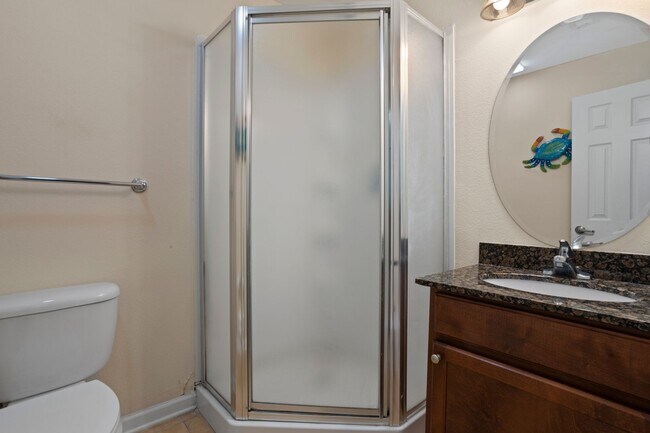 Building Photo - WATERFRONT LIVING! BEAUTIFULLY APPOINTED CONDO ON THE BAYOU IN OS SCHOOL DIST - FULLY FURNISHED