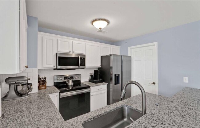 Building Photo - 7869 Ambassador Dr