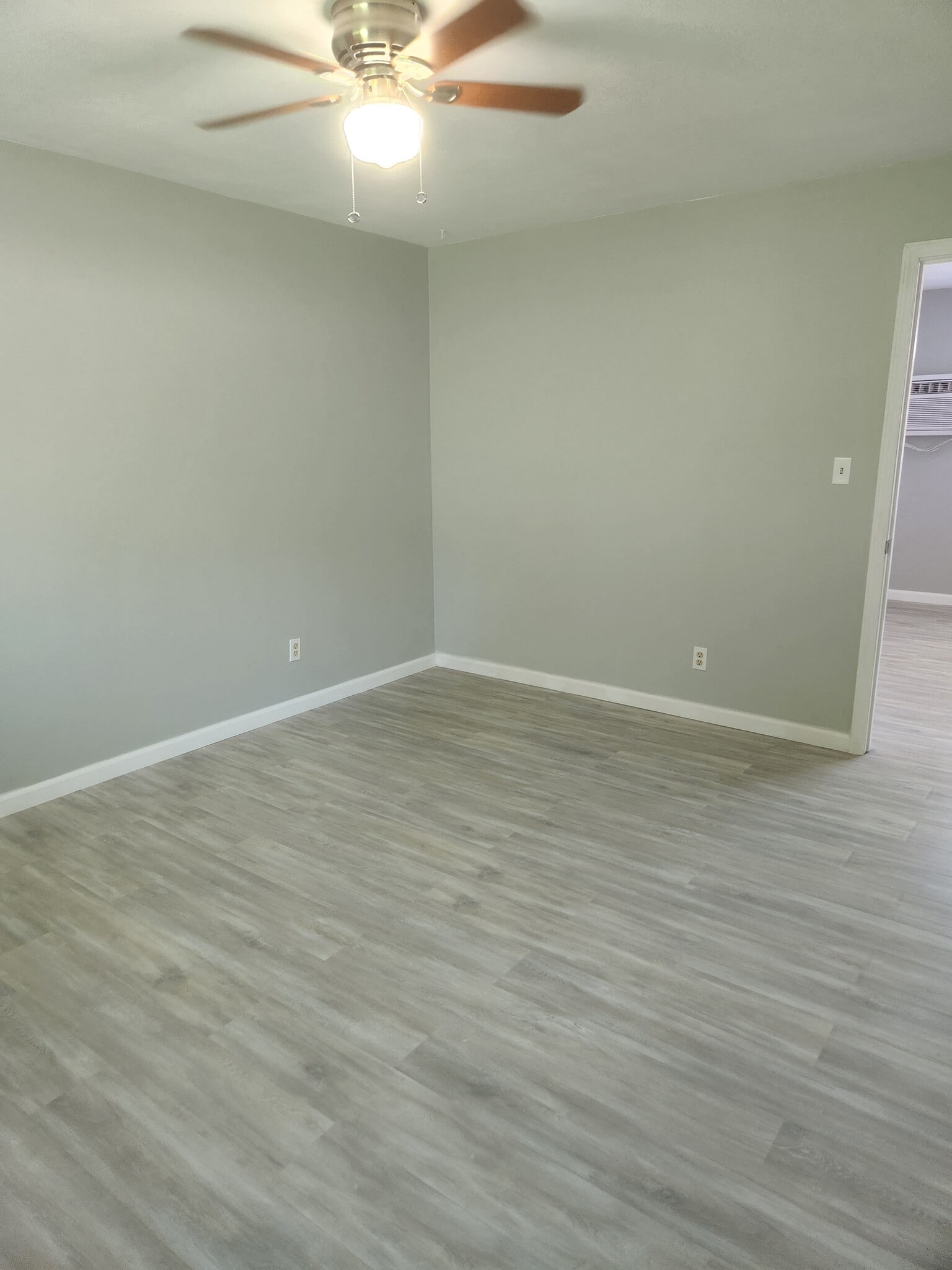 Ceiling fan and large bedroom window - 212 N 44th St