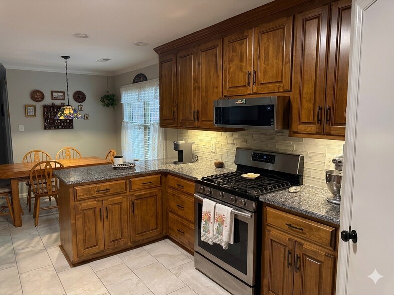 Updated kitchen with new appliances - 4019 Windswept Dr
