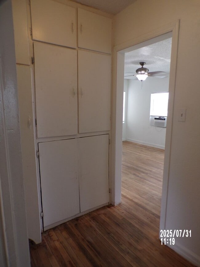 Building Photo - NEW listing-refinished hardwood floors, new laminate and paint throughout