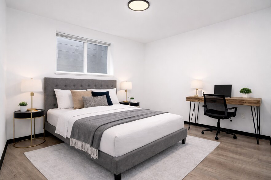 Furnished Bedroom with Queen Bed (Furnishings may vary) - 5004 7th Ave NE