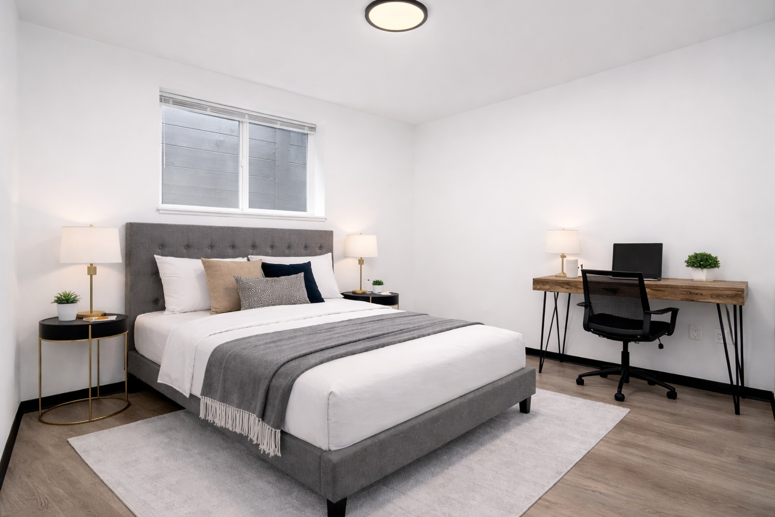 Furnished Bedroom with Queen Bed (Furnishings may vary) - 5004 7th Ave NE