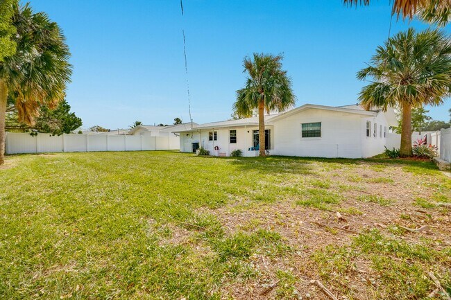 Building Photo - Welcome to your Perfect Beachside Retreat!