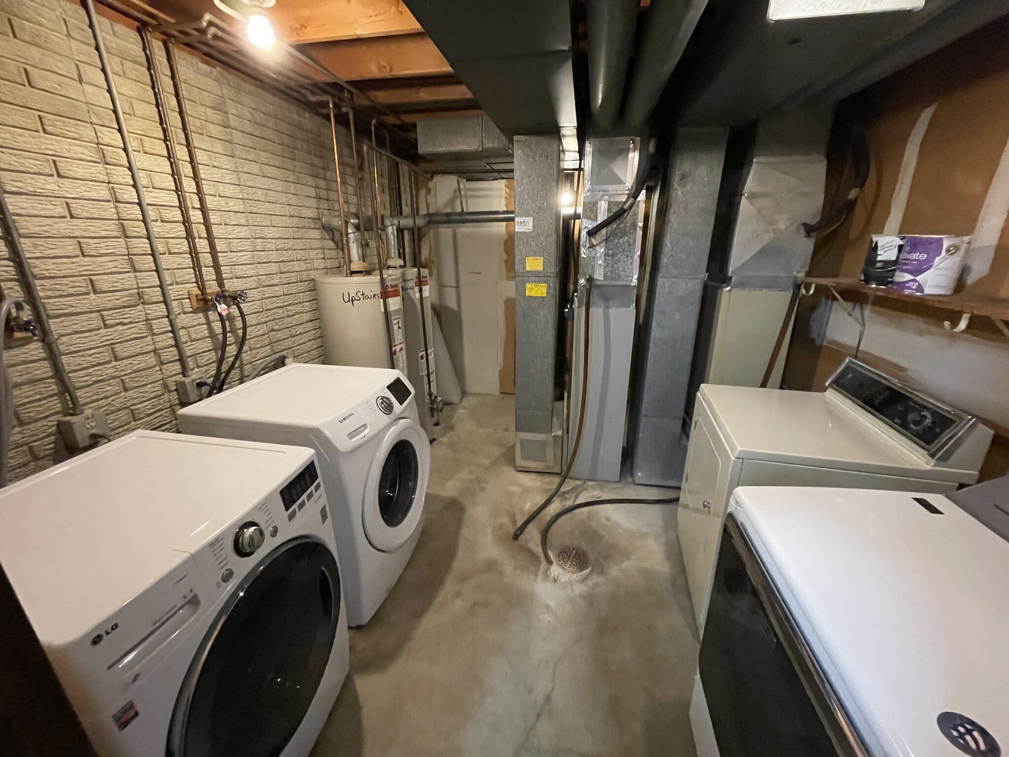 Shared laundry area but each unit has it's own washer and dryer (no coins!) - 715 Westgate St