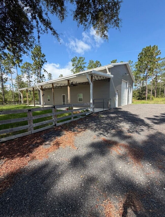 Building Photo - Gated 10-Acre Luxury Retreat with 40x60 Shop & Barn!
