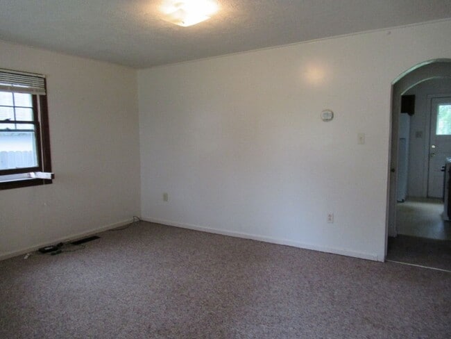 Building Photo - 3 bedroom, 1 bath. Large yard with large storage shed.