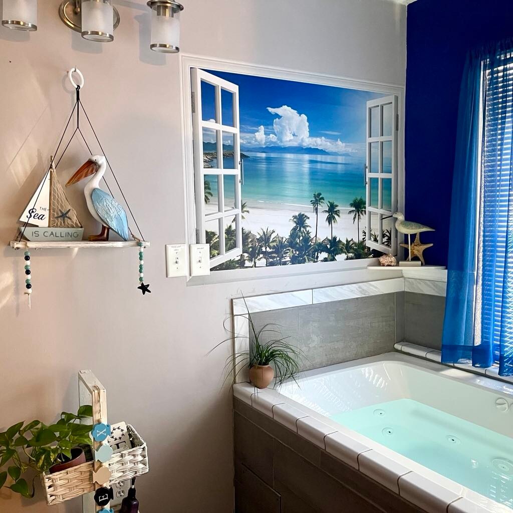 Indulge in a luxurious Jacuzzi bathtub that transforms your bathroom into a serene spa oasis - 2171 Weatherstone Cir SE
