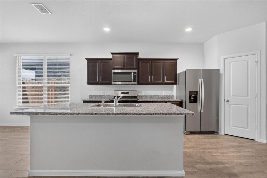 Building Photo - 8613 Wildwest Dr