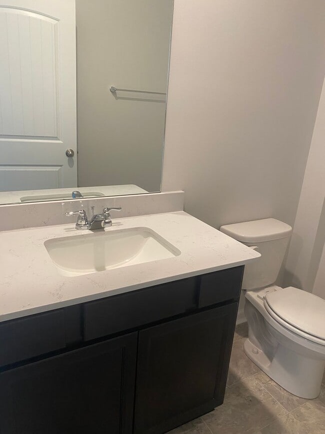 Building Photo - Brand New Construction - 4 bedroom 2 full ...