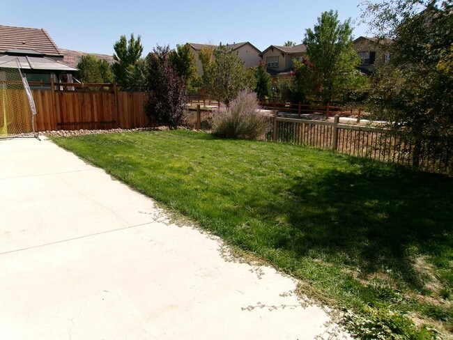 Building Photo - Beautiful 4 bedroom, 2-1/2 bath home in Wingfield Springs