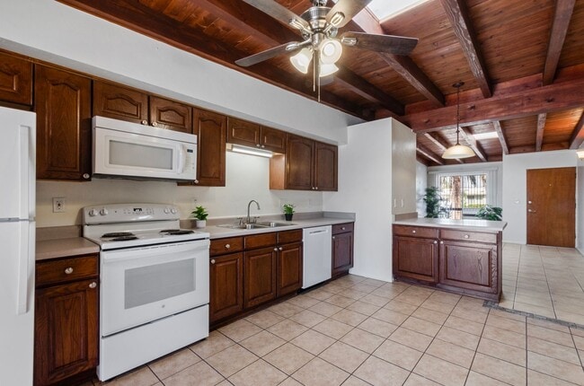 Building Photo - Available March 1, 2026. Updated 2 Bedroom 1.5 Bath Duplex with private dedicated pool.