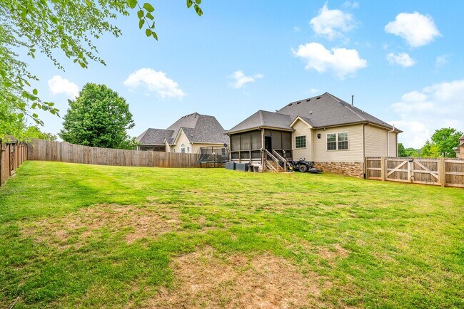 Building Photo - Move-In Special! Spacious 4-Bedroom Home w...