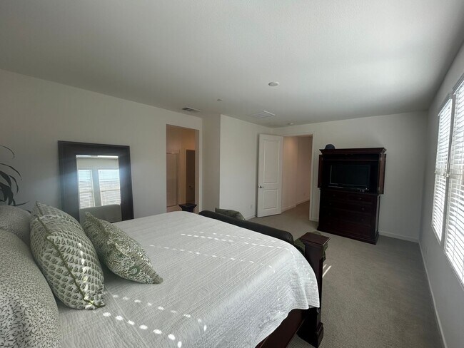 Building Photo - Modern 4 Bedroom Home with Downstairs Suite, Owned Solar & Resort-Style HOA Amenities