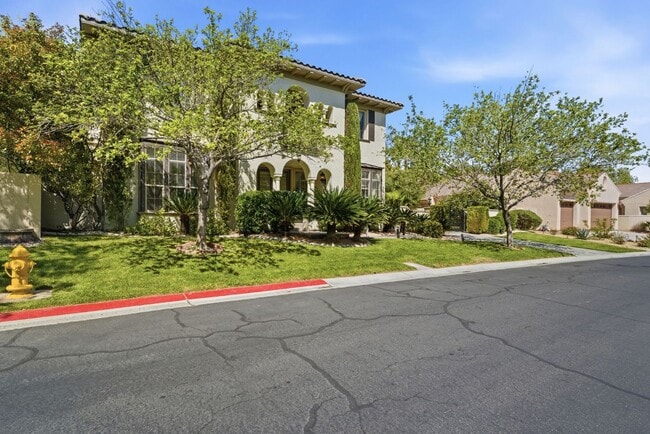 Building Photo - Private Gated Christopher Homes Estate in The Vineyards | Resort-Style Backyard & Strip Views