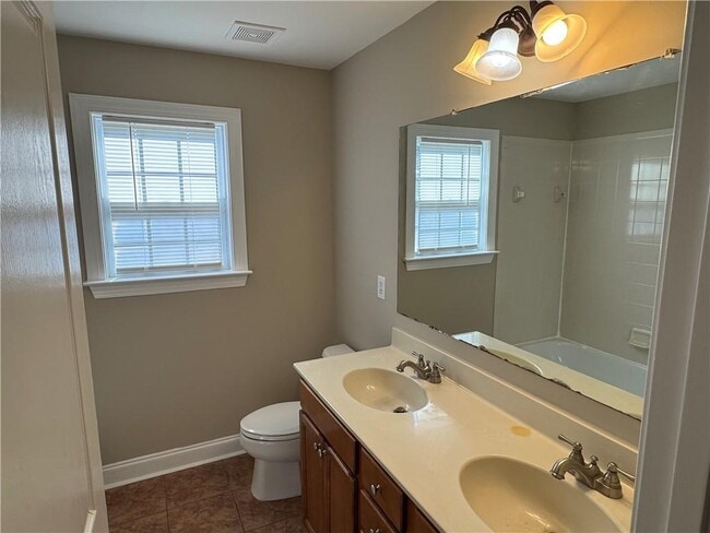 Building Photo - 7411 Redbud Loop