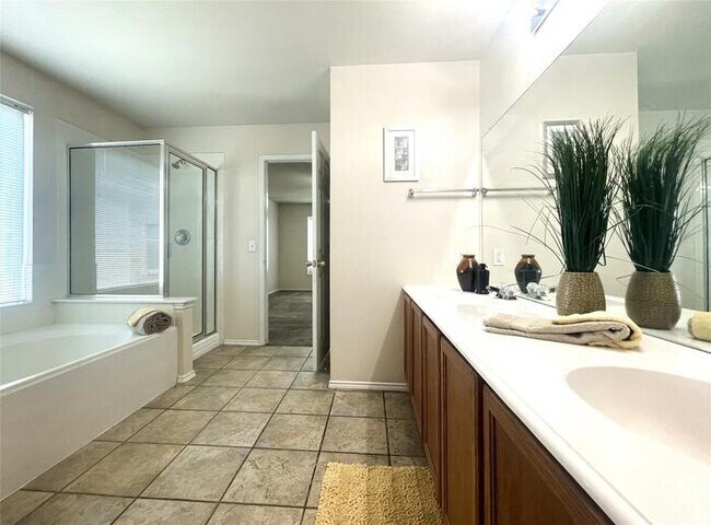 Building Photo - Plank Floors & Modern Comforts!" "Corner Fireplace, Split Bedrooms & a Master Retreat You’ll Love!"