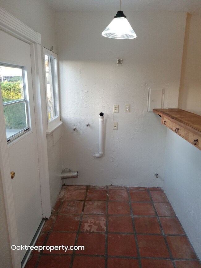 Building Photo - Coming Soon Charming 2-bedroom, 1-bathroom house with 2 car garage and spacious yard