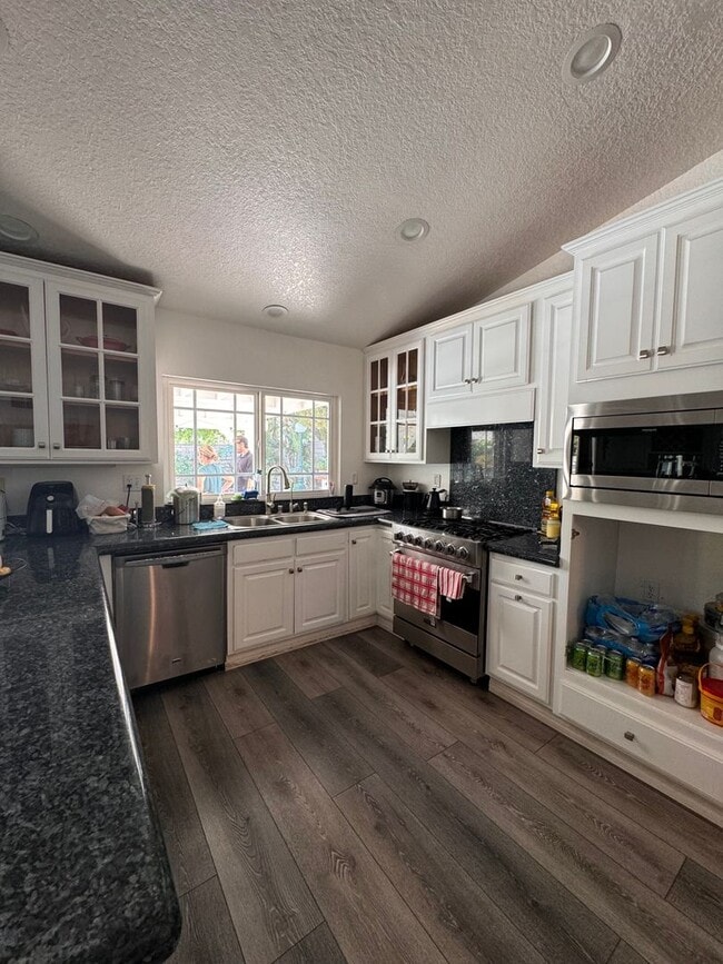 Building Photo - BEAUTIFULLY Updated Home with Pool+ Modern...