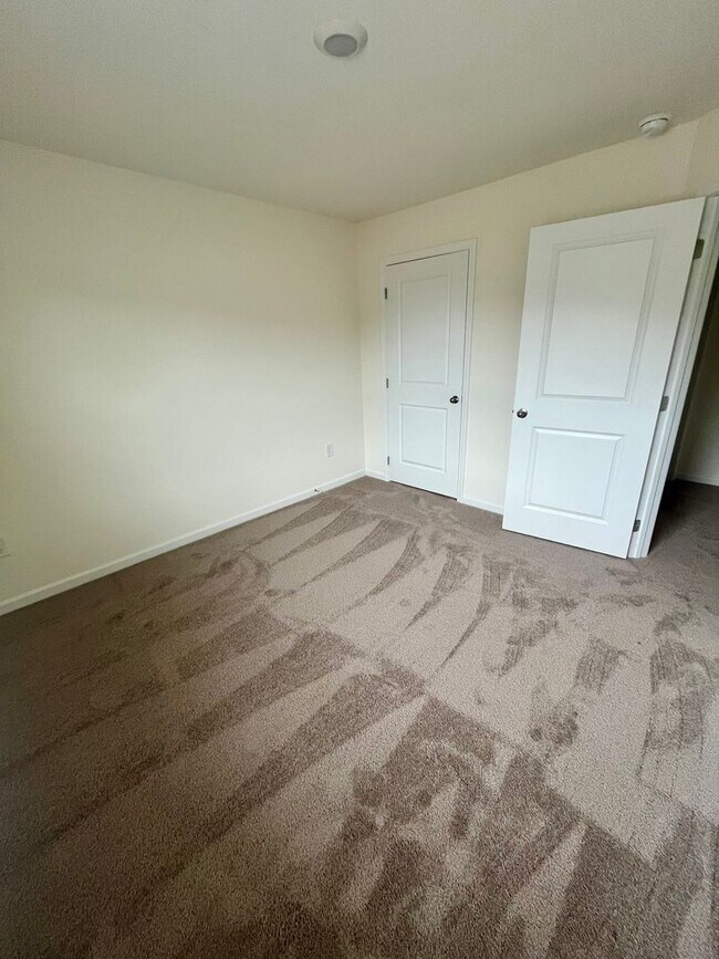 Building Photo - Be the First to Call This Brand New Townho...
