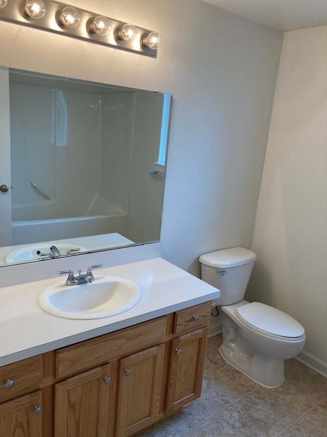 Building Photo - Three Bedroom Home, Landscaping Included!