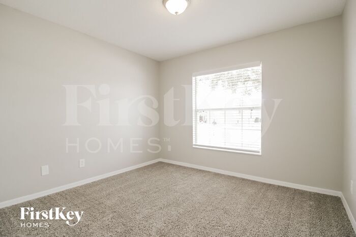 Building Photo - 5771 Cinnamon Fern Blvd