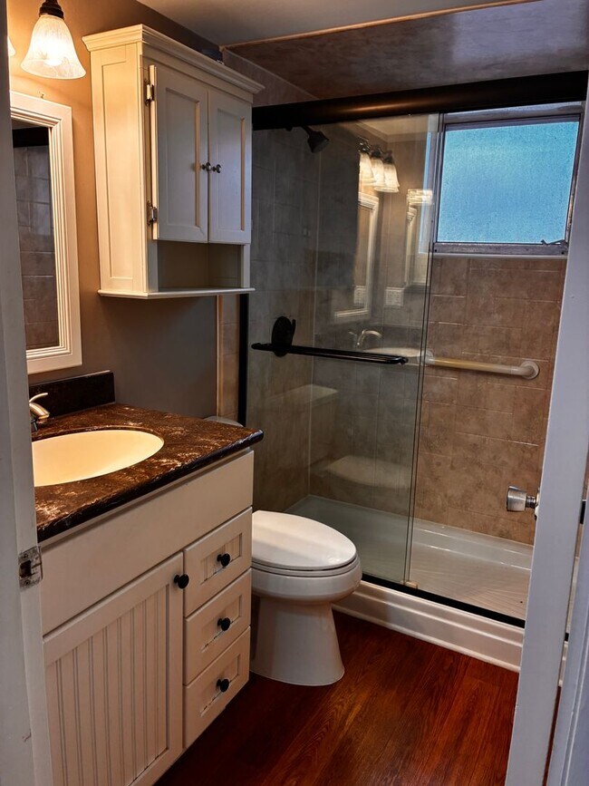 Building Photo - 55+ Charming first-floor condo nestled in the serene Fairways 3 Condominiums