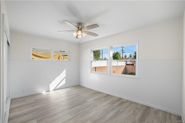 Building Photo - Welcome to this inviting 3 bedroom, 2 bath residence tucked away on a peaceful street in the hear...