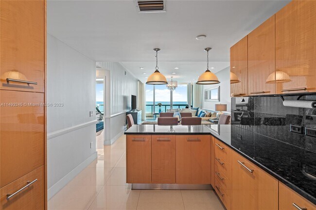 Building Photo - 6899 Collins Ave