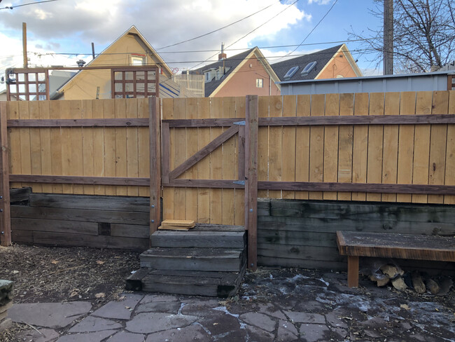 Fenced in back patio is perfect for a dog - 3434 Lawrence St