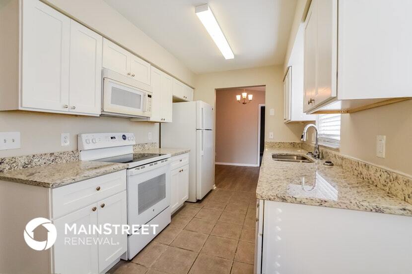 Building Photo - 8734 Brackenwood Dr