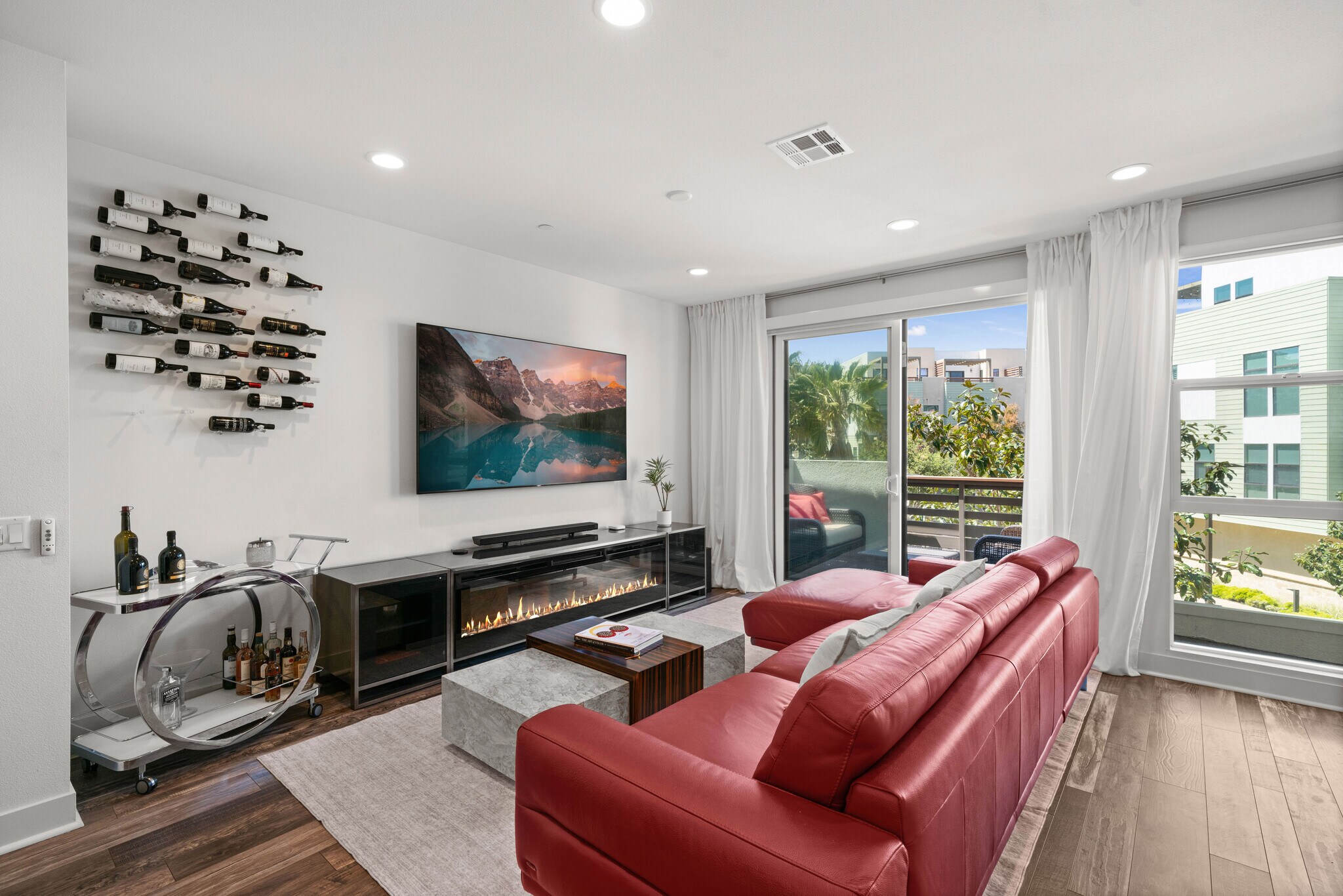 Living Room looks out onto the patio and tree top - 1651 Topanga