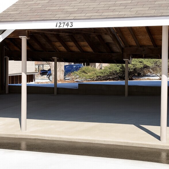 The private carport is included in the rent - 12743 W 110th Ter