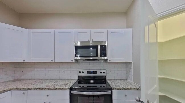 Building Photo - Move-In Ready 4-Bedroom Home with Timeless Appeal