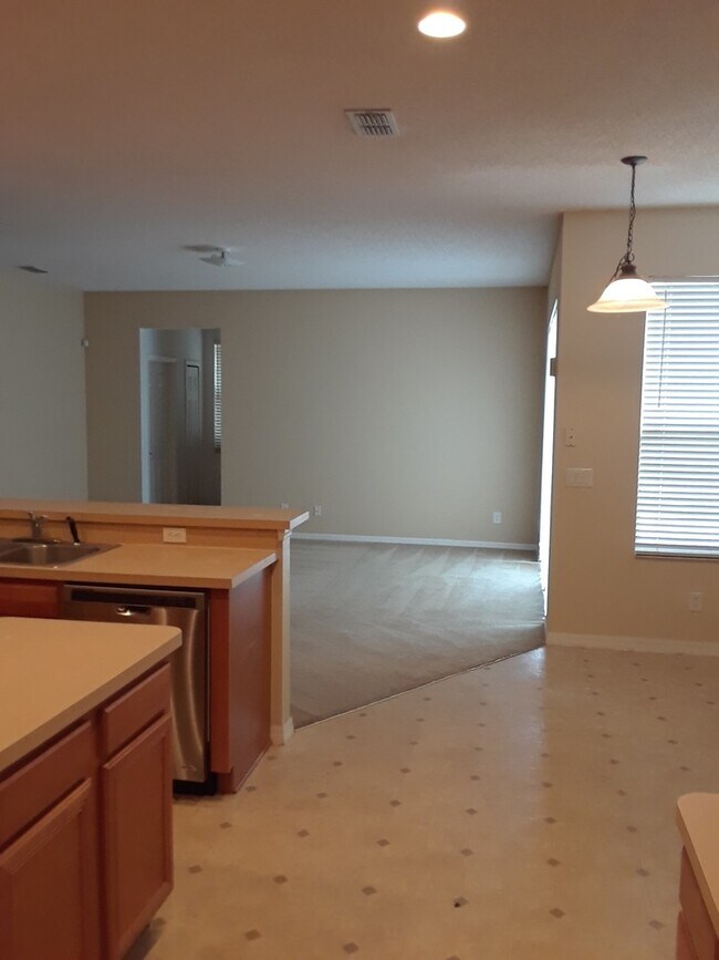 Building Photo - Spacious 4-Bedroom Pool Home with 3-Car Ga...