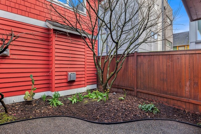 Building Photo - A Quiet Retreat with Parking, Patio, and City Proximity