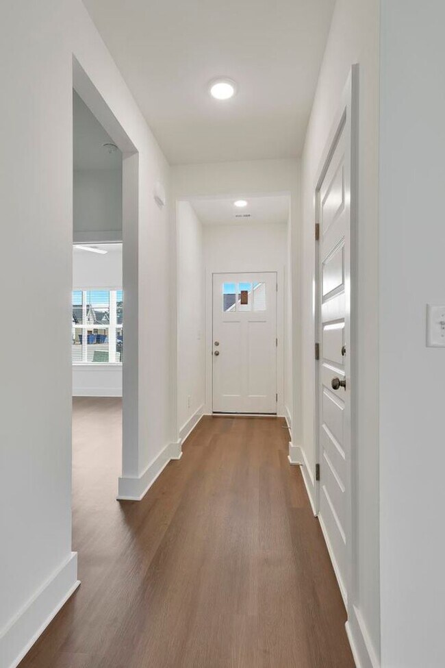 Building Photo - One Level Home with Garage and Fenced Back...