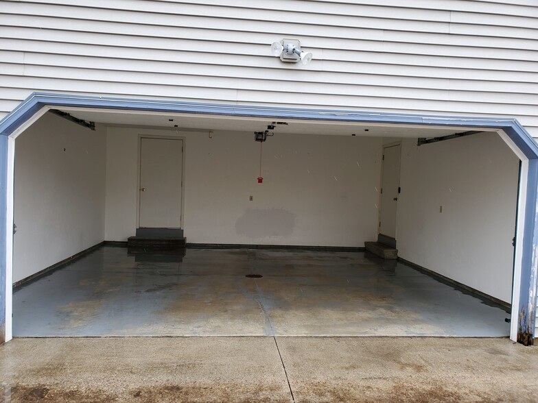 Garage with extra storage room unit - 202 S Maple Ave