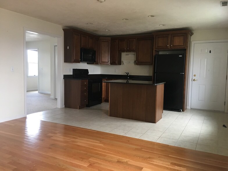 Granite countertops with island. - 24 Spring Bars Rd