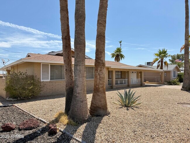 Building Photo - 12247 N Cherry Hills Dr W