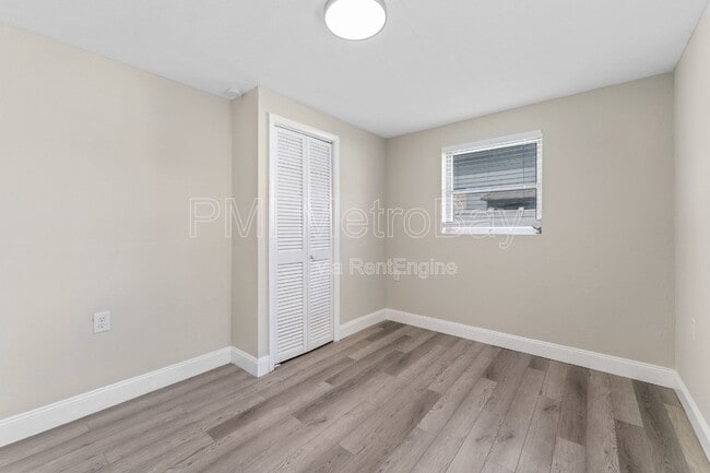 Building Photo - 6121 N Falkenburg Rd