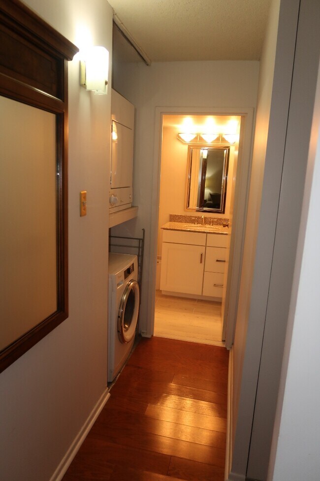 Hallway w/ washer and dryer - 666 W Germantown Pike