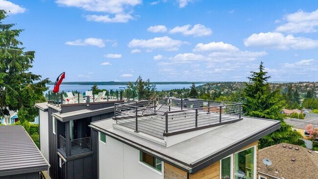 Building Photo - Air Conditioned Hilltop Gem w/ 360° Rooftop Ocean, Mountain and Skyline Views