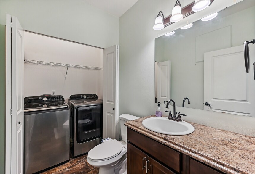 Powder Bath with Utilitiy Closet - 9306 208th Ave E