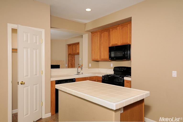 Kitchen with island - 7515 Sheldon Rd